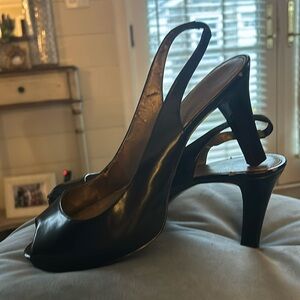 Black peep toe sling back pump